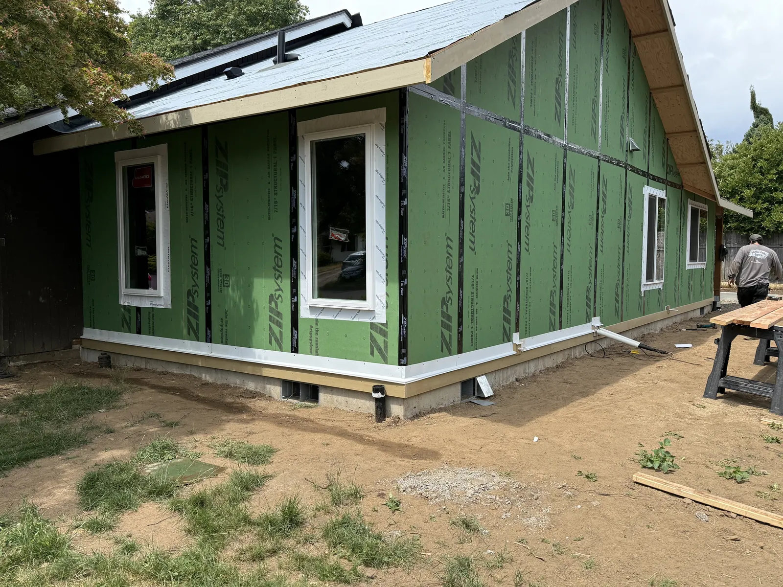 Addition. Framed, sheathed, windows in