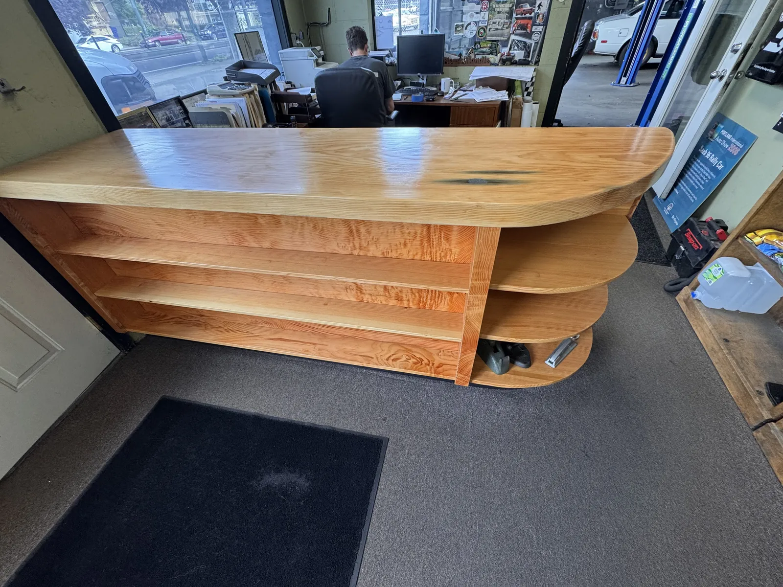 Custom entry cabinet. The curved end