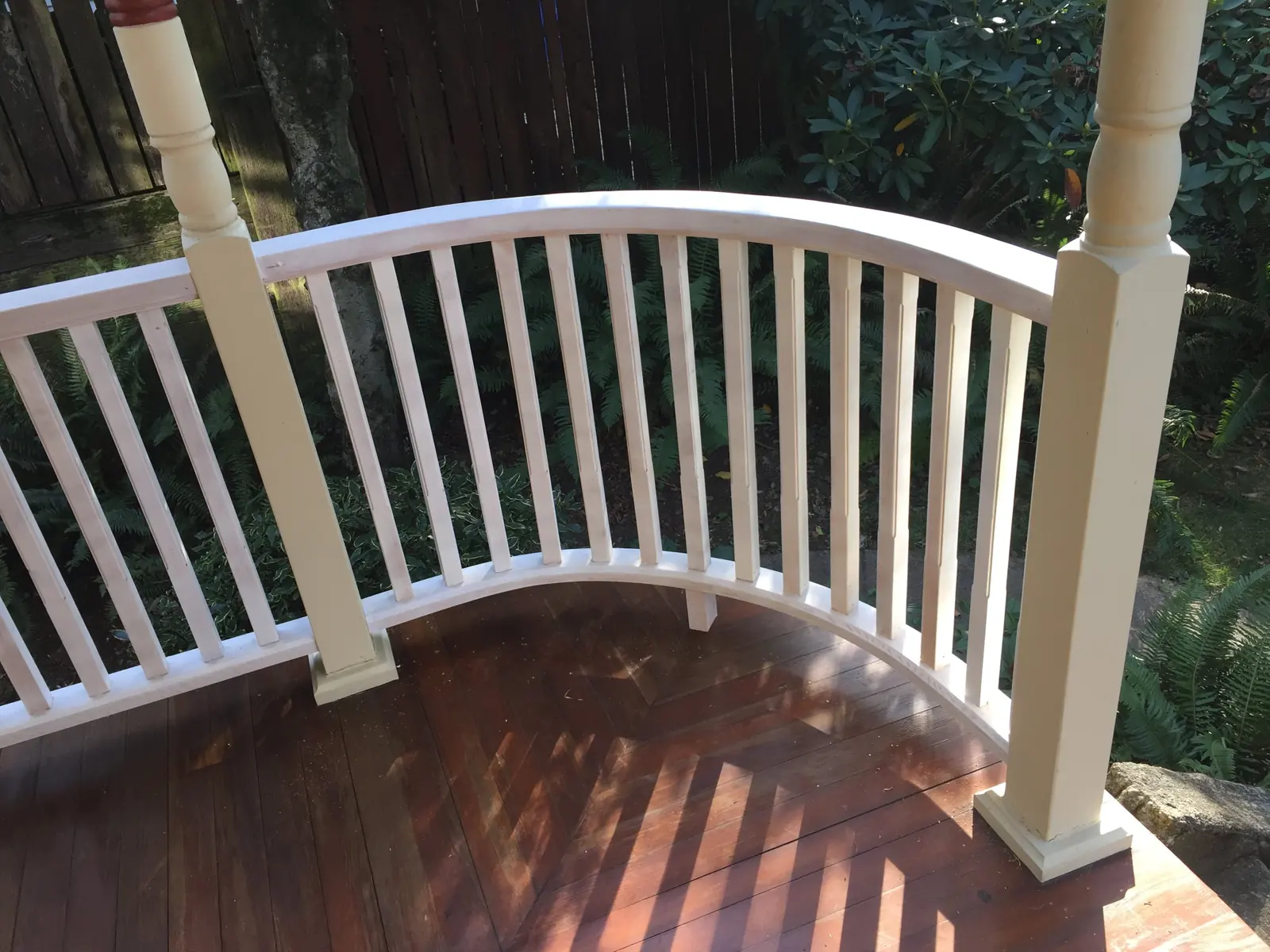 Curved porch railing replacement on a 1920s Victorian in Portland's Brooklyn neighborhood