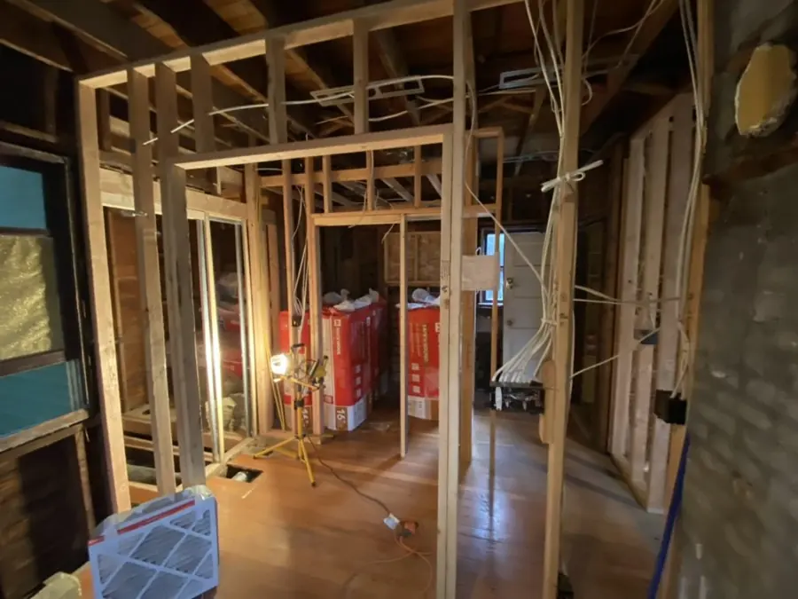 Gut remodel of a 1920s craftsman house in Portland, framing exposed