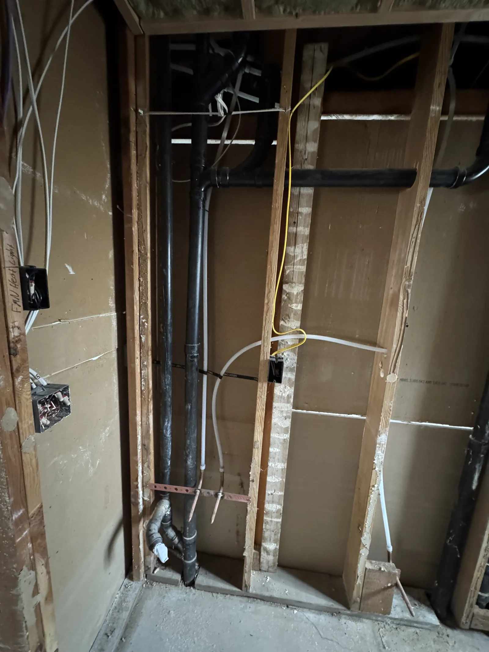 Remodel, during. New framing and plumbing rough-in